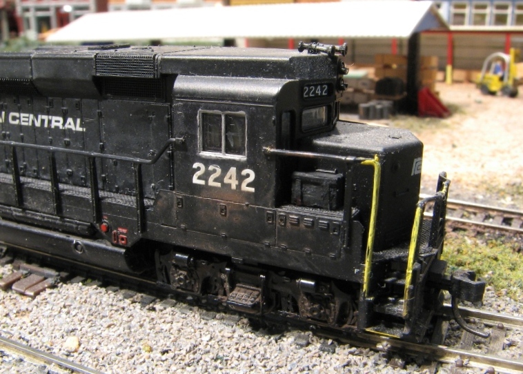 Atlas Model Railroad Co. - Kato step and handrail painting